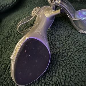 Silver Velcro high heel shoes. Size 8. Only wore a few times